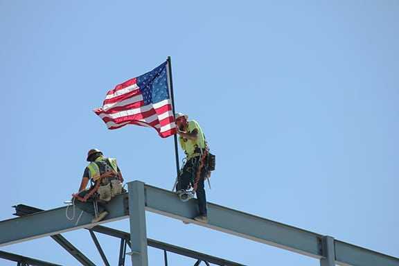 Fisher, NewCold and McCain Celebrate Steel Top Off